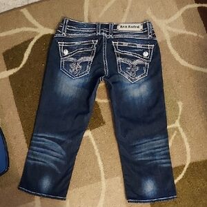 SOLD     ROCK REVIVAL JOHANNA Rhinestone Distressed Low Rise Capri's 28